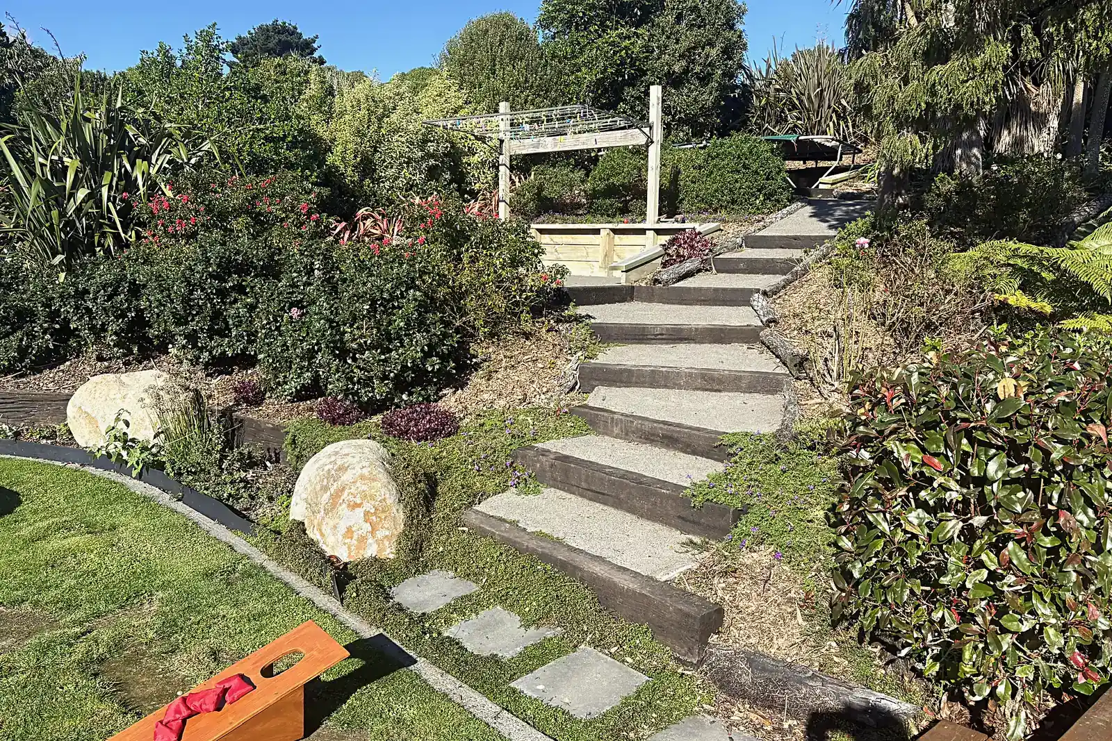 Sleeper steps and stepping stones through a garden, Plimmerton