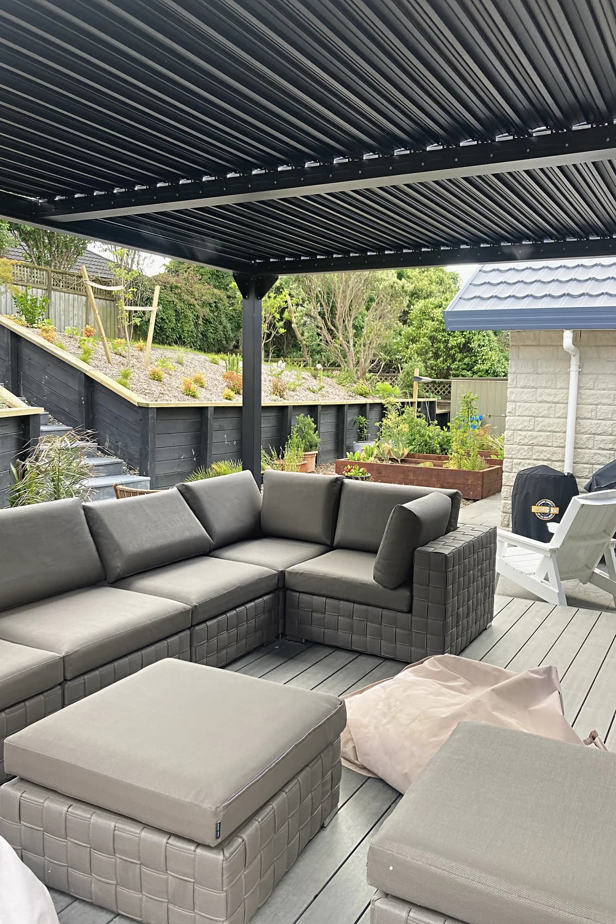 Outdoor seating under a louvred roof, Whitby