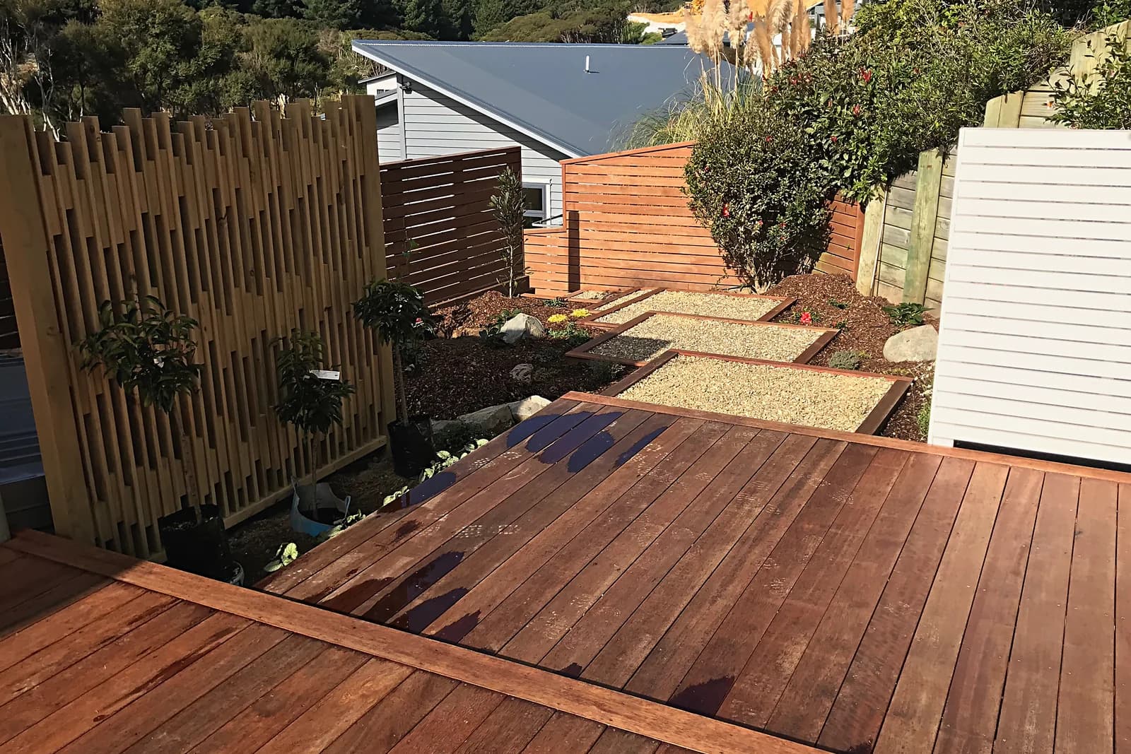 Hardwood deck beside a slatted timber screen, Whitby