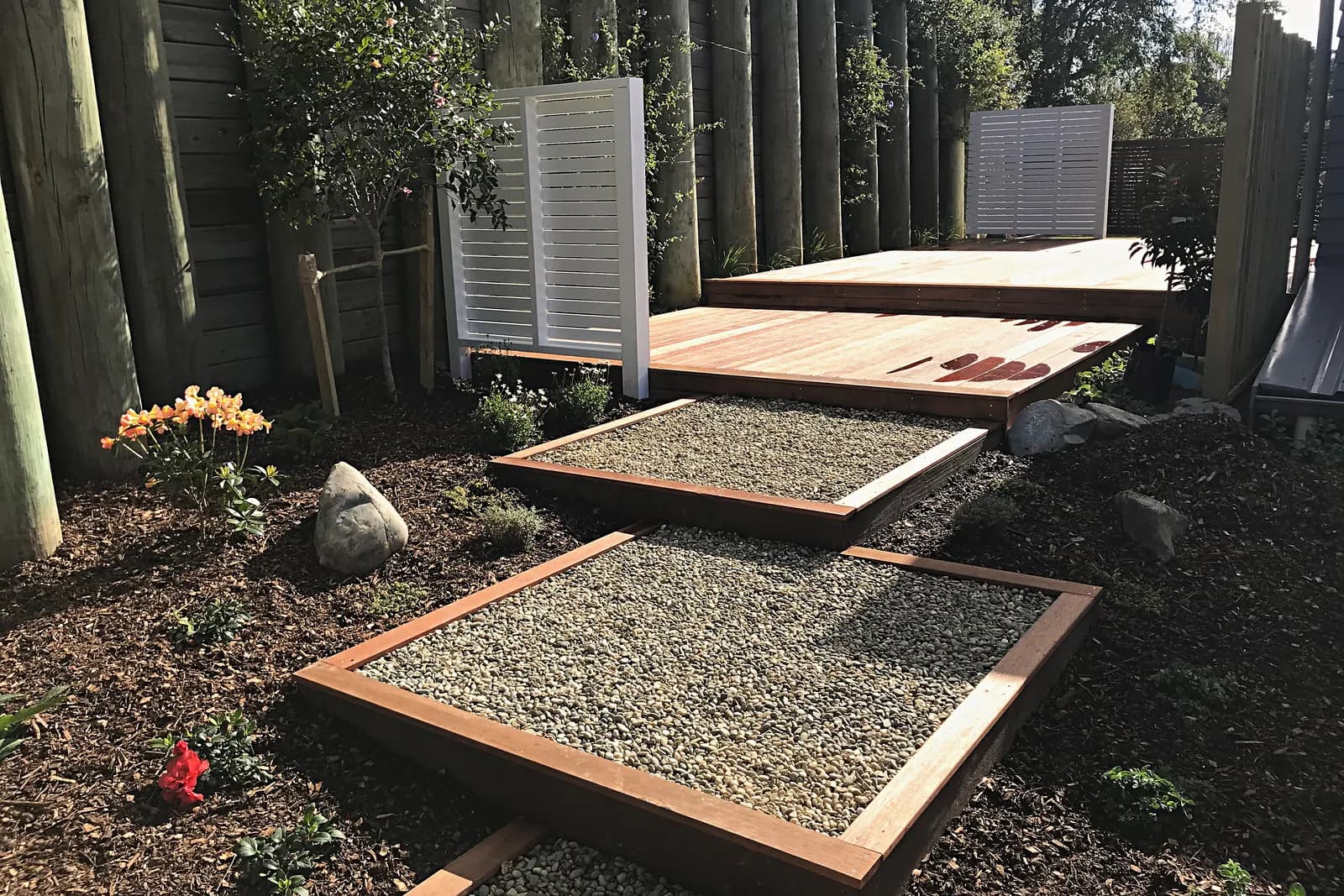Framed gravel steps leading to a hardwood deck, Whitby