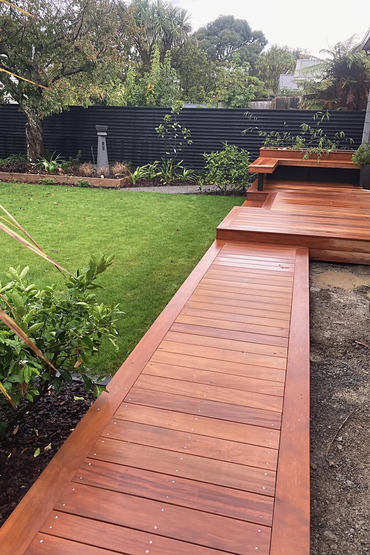 Hardwood boardwalk beside a lawn, Woburn